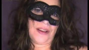 Slut in a sexy mask masturbates and gets fucked