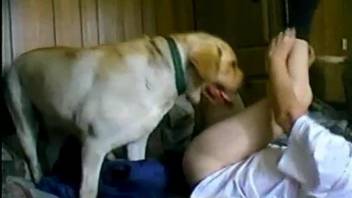 Seductive MILF riding a dog's throbbing red cock