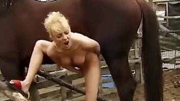 Sensual blonde with big boobs enjoys bestiality